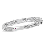 Roberto Coin Love in Verona 18ct white gold diamond bangle with pavé flower motifs and signature hidden rubies inside the clasp.