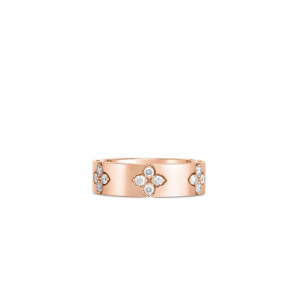 Roberto Coin Love in Verona ring in 18ct rose gold featuring 20 round brilliant cut diamonds and a signature hidden ruby inside the polished 6mm band.