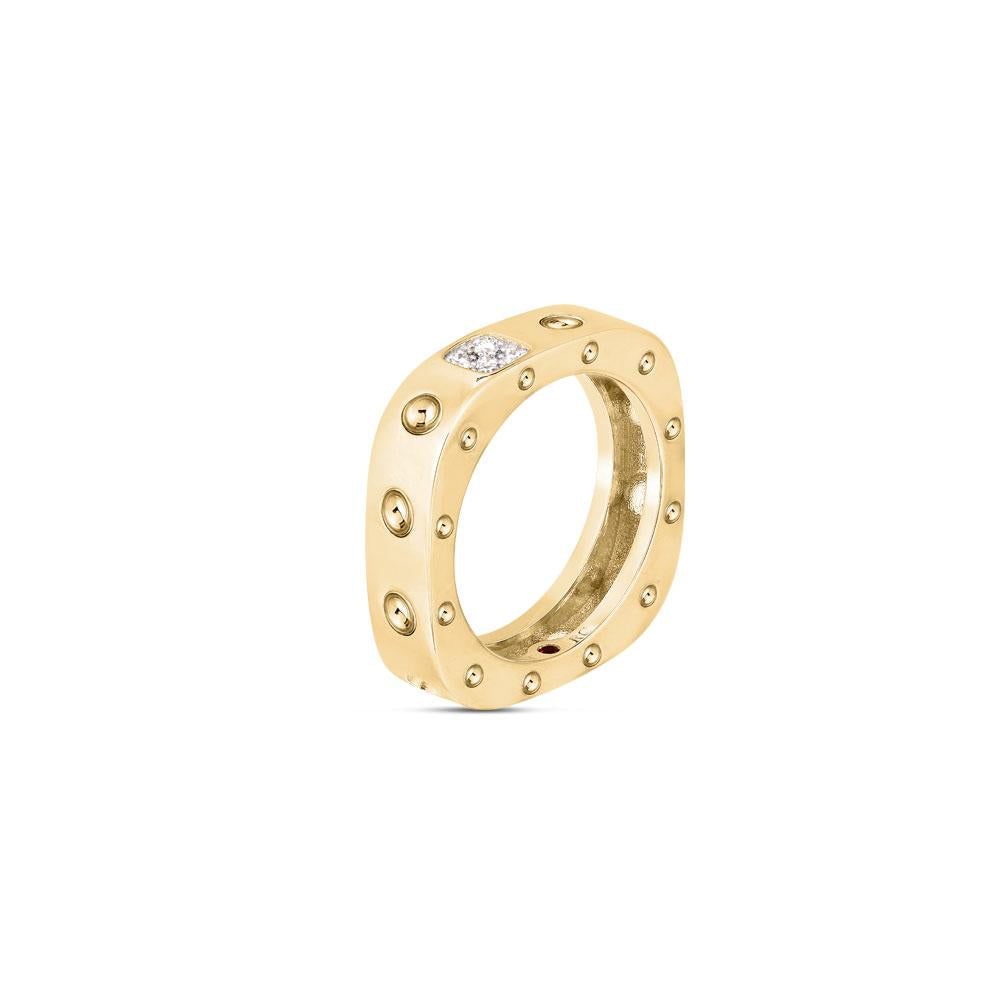 Roberto Coin Pois Moi ring in 18ct yellow and white gold featuring concave detailing, diamond bead-set squares, and a signature hidden ruby inside the band.