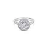 18ct white gold diamond halo ring featuring a 1.00ct round brilliant cut centre diamond with bead-set halo, undercarriage, and shoulders with millgrain finish.