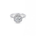 18ct white gold diamond halo ring featuring a 1.01ct round brilliant cut centre diamond with a circular diamond halo and claw-set shoulders.