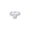 Platinum diamond ring featuring a 1.01ct round brilliant cut centre diamond with sixteen round brilliant cut diamond accents.