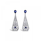 18ct white gold drop earrings with sunray-style sapphire and diamond clusters, tapered cut-out drops, and post and butterfly fittings.